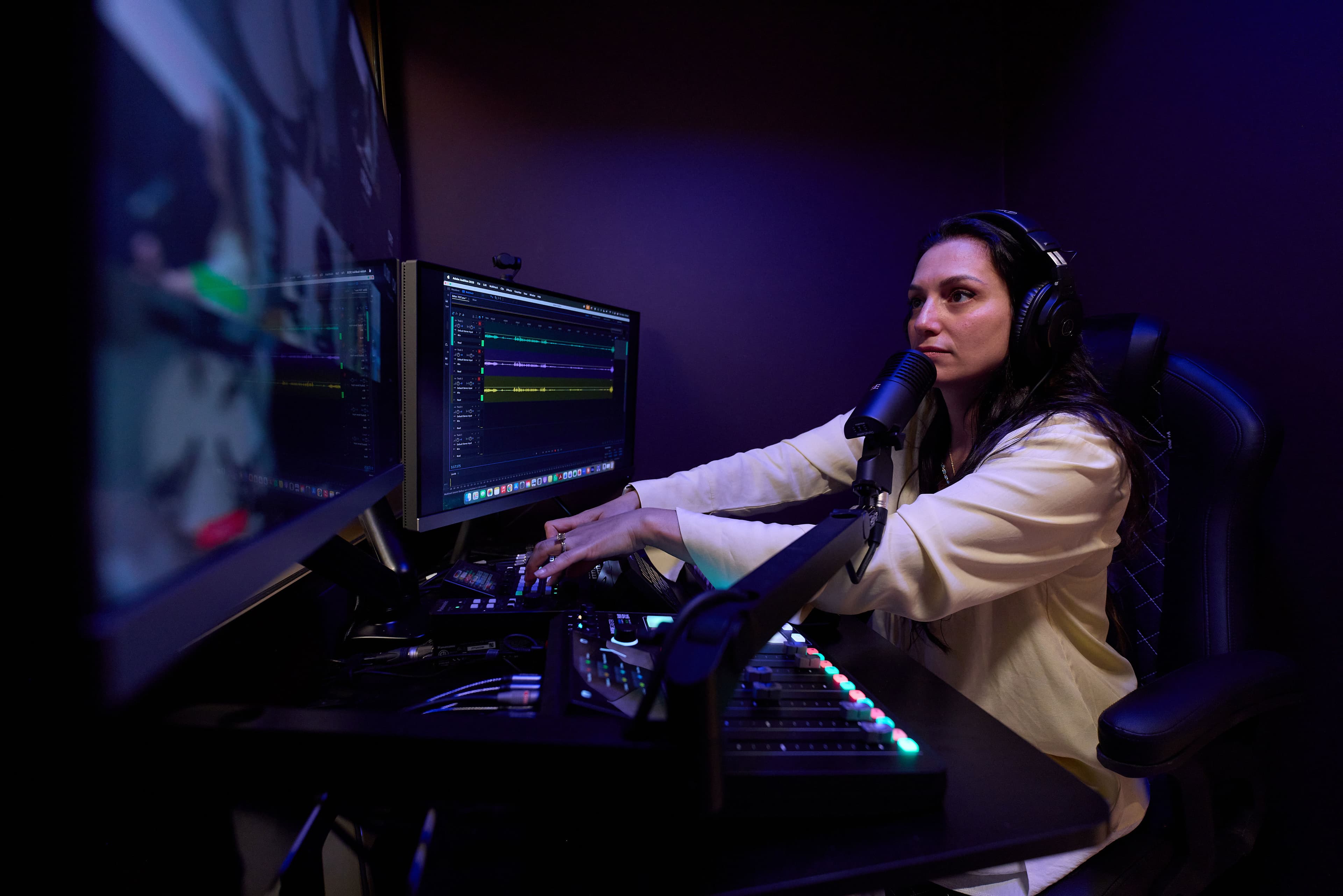 A podcast producer in the producer room